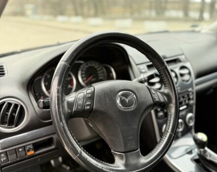 Черный Мазда 6, объемом двигателя 2 л и пробегом 390 тыс. км за 2700 $, фото 4 на Automoto.ua