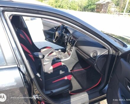 Черный Мазда 6, объемом двигателя 2 л и пробегом 273 тыс. км за 3700 $, фото 1 на Automoto.ua