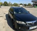 Черный Мазда 6, объемом двигателя 2 л и пробегом 225 тыс. км за 7000 $, фото 1 на Automoto.ua