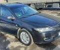 Черный Мазда 6, объемом двигателя 2 л и пробегом 284 тыс. км за 5500 $, фото 1 на Automoto.ua