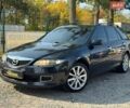 Черный Мазда 6, объемом двигателя 2.3 л и пробегом 221 тыс. км за 5500 $, фото 1 на Automoto.ua