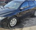 Черный Мазда 6, объемом двигателя 2 л и пробегом 284 тыс. км за 5500 $, фото 1 на Automoto.ua