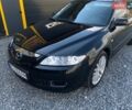 Черный Мазда 6, объемом двигателя 2 л и пробегом 258 тыс. км за 5400 $, фото 1 на Automoto.ua