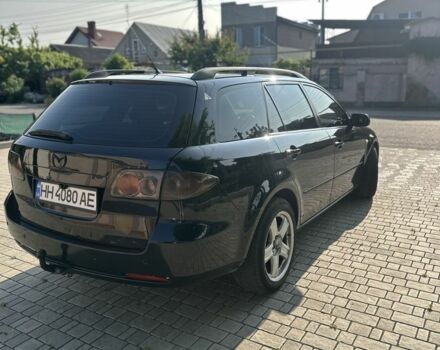 Черный Мазда 6, объемом двигателя 2 л и пробегом 240 тыс. км за 4250 $, фото 2 на Automoto.ua