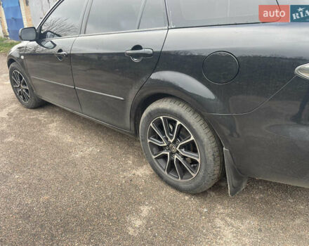 Черный Мазда 6, объемом двигателя 1.8 л и пробегом 251 тыс. км за 6200 $, фото 13 на Automoto.ua