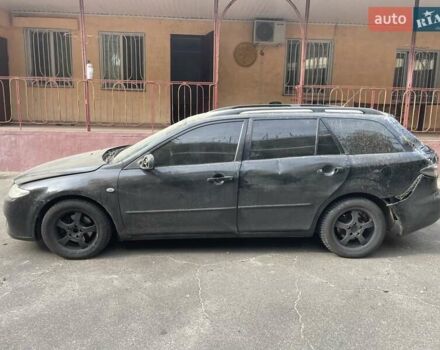 Черный Мазда 6, объемом двигателя 2 л и пробегом 305 тыс. км за 3500 $, фото 1 на Automoto.ua