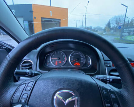 Черный Мазда 6, объемом двигателя 2 л и пробегом 140 тыс. км за 5700 $, фото 9 на Automoto.ua