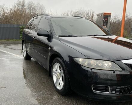 Черный Мазда 6, объемом двигателя 2 л и пробегом 140 тыс. км за 5700 $, фото 2 на Automoto.ua