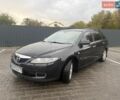 Черный Мазда 6, объемом двигателя 2 л и пробегом 258 тыс. км за 5300 $, фото 1 на Automoto.ua