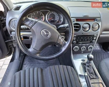Чорний Мазда 6, об'ємом двигуна 2 л та пробігом 256 тис. км за 4450 $, фото 26 на Automoto.ua
