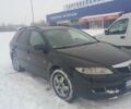 Черный Мазда 6, объемом двигателя 2 л и пробегом 320 тыс. км за 3500 $, фото 1 на Automoto.ua