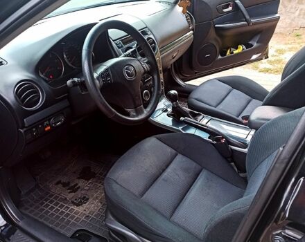 Черный Мазда 6, объемом двигателя 2 л и пробегом 325 тыс. км за 5800 $, фото 6 на Automoto.ua