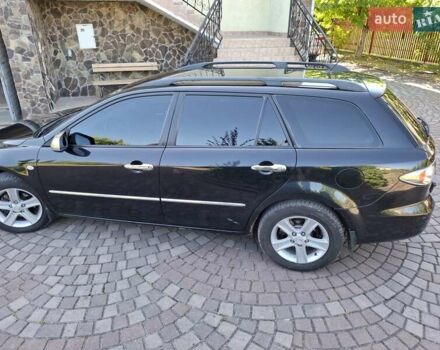 Чорний Мазда 6, об'ємом двигуна 2 л та пробігом 256 тис. км за 4450 $, фото 1 на Automoto.ua