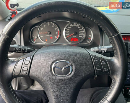 Черный Мазда 6, объемом двигателя 1.8 л и пробегом 251 тыс. км за 6200 $, фото 14 на Automoto.ua