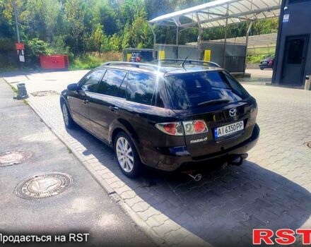 Чорний Мазда 6, об'ємом двигуна 2.3 л та пробігом 200 тис. км за 5200 $, фото 4 на Automoto.ua