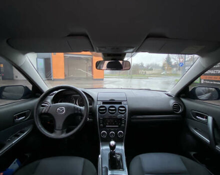 Черный Мазда 6, объемом двигателя 2 л и пробегом 140 тыс. км за 5700 $, фото 7 на Automoto.ua