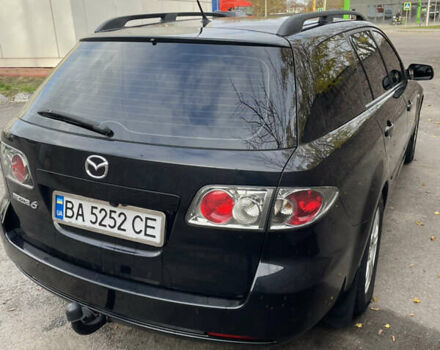 Черный Мазда 6, объемом двигателя 1.8 л и пробегом 251 тыс. км за 6200 $, фото 2 на Automoto.ua