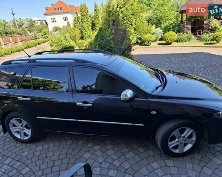 Чорний Мазда 6, об'ємом двигуна 2 л та пробігом 256 тис. км за 4450 $, фото 5 на Automoto.ua