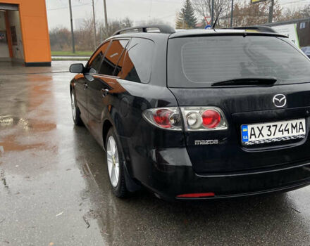 Черный Мазда 6, объемом двигателя 2 л и пробегом 140 тыс. км за 5700 $, фото 4 на Automoto.ua