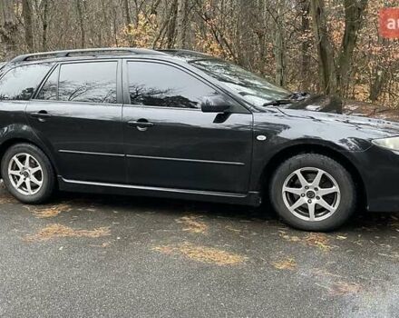 Черный Мазда 6, объемом двигателя 2.3 л и пробегом 293 тыс. км за 5300 $, фото 7 на Automoto.ua