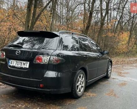 Черный Мазда 6, объемом двигателя 2.3 л и пробегом 293 тыс. км за 5300 $, фото 1 на Automoto.ua