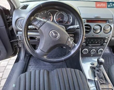 Чорний Мазда 6, об'ємом двигуна 2 л та пробігом 256 тис. км за 4450 $, фото 21 на Automoto.ua