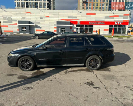 Черный Мазда 6, объемом двигателя 2 л и пробегом 342 тыс. км за 4500 $, фото 3 на Automoto.ua