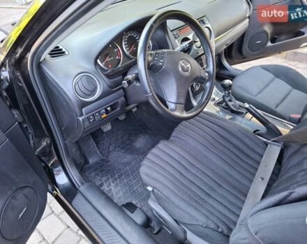 Чорний Мазда 6, об'ємом двигуна 2 л та пробігом 256 тис. км за 4450 $, фото 24 на Automoto.ua