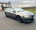 Черный Мазда 6, объемом двигателя 2 л и пробегом 230 тыс. км за 2656 $, фото 1 на Automoto.ua