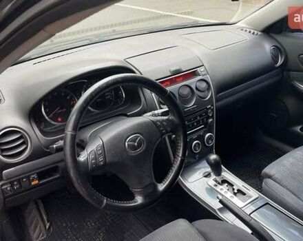 Черный Мазда 6, объемом двигателя 2.3 л и пробегом 293 тыс. км за 5300 $, фото 10 на Automoto.ua