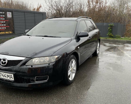 Черный Мазда 6, объемом двигателя 2 л и пробегом 140 тыс. км за 5700 $, фото 1 на Automoto.ua