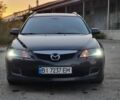Черный Мазда 6, объемом двигателя 2 л и пробегом 226 тыс. км за 5000 $, фото 1 на Automoto.ua