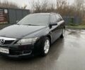 Черный Мазда 6, объемом двигателя 2 л и пробегом 140 тыс. км за 5700 $, фото 1 на Automoto.ua