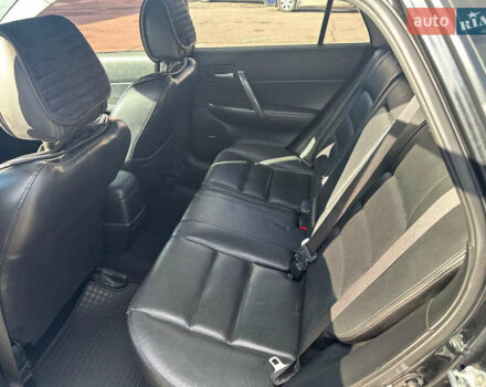 Черный Мазда 6, объемом двигателя 2 л и пробегом 342 тыс. км за 4500 $, фото 5 на Automoto.ua