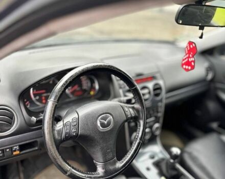 Черный Мазда 6, объемом двигателя 2 л и пробегом 230 тыс. км за 2656 $, фото 8 на Automoto.ua