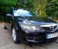 Черный Мазда 6, объемом двигателя 2 л и пробегом 325 тыс. км за 5800 $, фото 1 на Automoto.ua