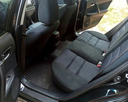 Черный Мазда 6, объемом двигателя 2 л и пробегом 325 тыс. км за 5800 $, фото 7 на Automoto.ua