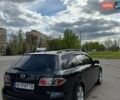 Черный Мазда 6, объемом двигателя 2 л и пробегом 246 тыс. км за 5400 $, фото 2 на Automoto.ua