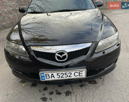 Черный Мазда 6, объемом двигателя 1.8 л и пробегом 251 тыс. км за 6200 $, фото 1 на Automoto.ua