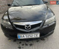 Черный Мазда 6, объемом двигателя 1.8 л и пробегом 251 тыс. км за 6200 $, фото 1 на Automoto.ua