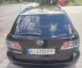Черный Мазда 6, объемом двигателя 2.26 л и пробегом 200 тыс. км за 5200 $, фото 1 на Automoto.ua