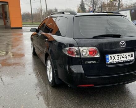 Черный Мазда 6, объемом двигателя 2 л и пробегом 140 тыс. км за 5700 $, фото 4 на Automoto.ua