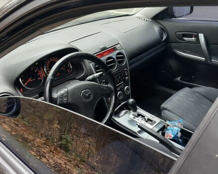 Черный Мазда 6, объемом двигателя 2.3 л и пробегом 293 тыс. км за 5300 $, фото 10 на Automoto.ua