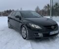 Черный Мазда 6, объемом двигателя 2 л и пробегом 318 тыс. км за 7000 $, фото 1 на Automoto.ua