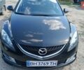 Черный Мазда 6, объемом двигателя 2 л и пробегом 247 тыс. км за 7501 $, фото 1 на Automoto.ua