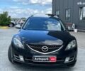 Черный Мазда 6, объемом двигателя 2 л и пробегом 267 тыс. км за 6990 $, фото 1 на Automoto.ua