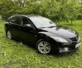 Черный Мазда 6, объемом двигателя 2 л и пробегом 210 тыс. км за 8500 $, фото 1 на Automoto.ua