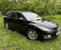 Черный Мазда 6, объемом двигателя 2 л и пробегом 210 тыс. км за 8500 $, фото 1 на Automoto.ua