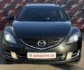 Черный Мазда 6, объемом двигателя 2 л и пробегом 321 тыс. км за 6000 $, фото 1 на Automoto.ua