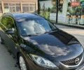 Черный Мазда 6, объемом двигателя 2 л и пробегом 215 тыс. км за 6900 $, фото 1 на Automoto.ua